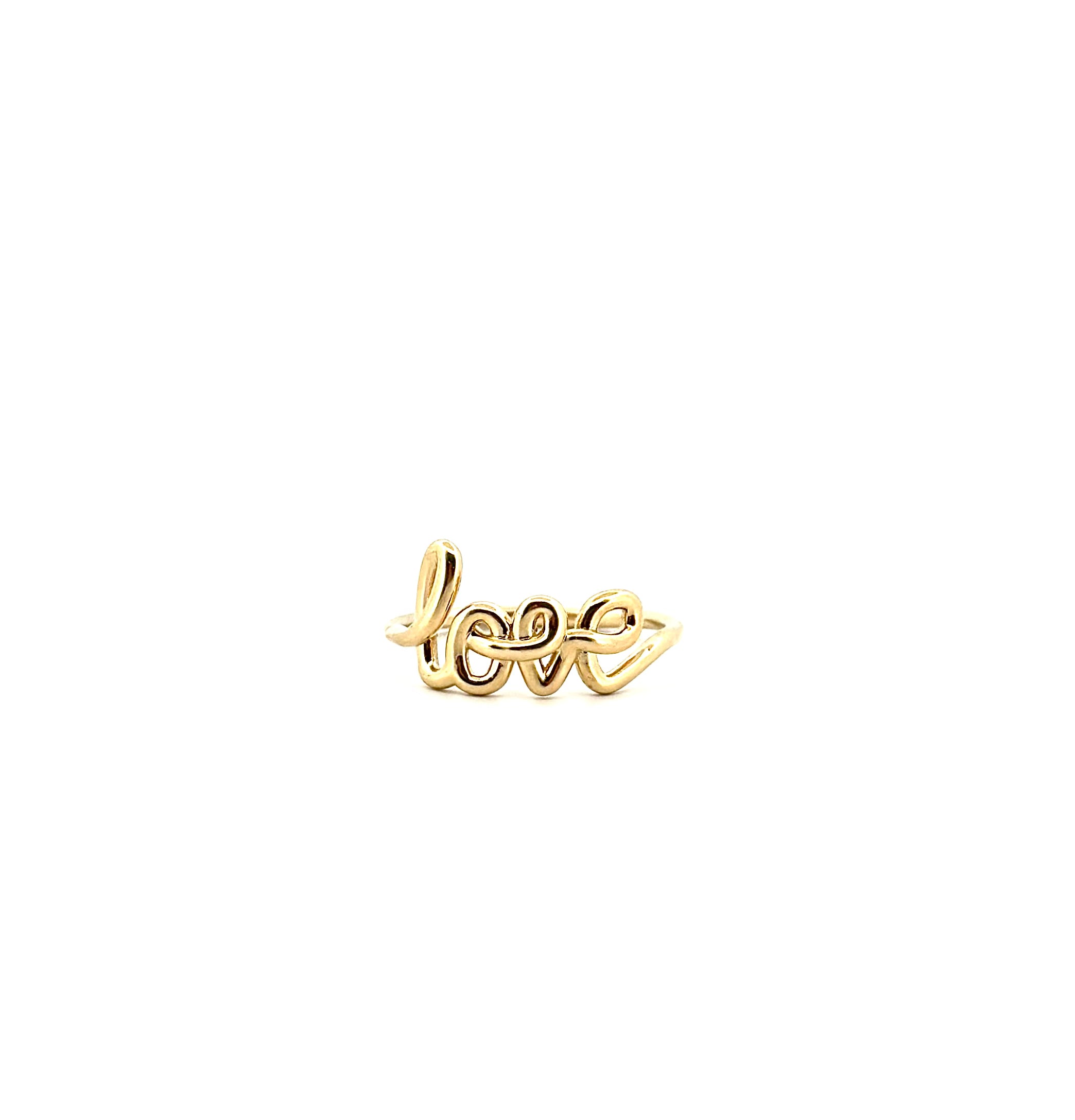 Zlatý prsten s nápisem 'Láska'
